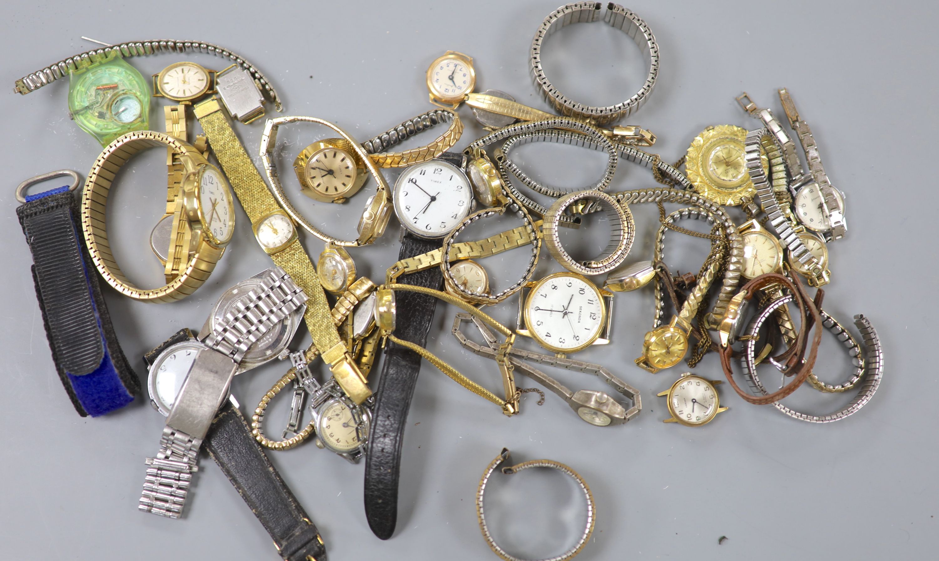 A collection of assorted lady's and gentleman's wristwatches including Timex, Accurist and Seiko.